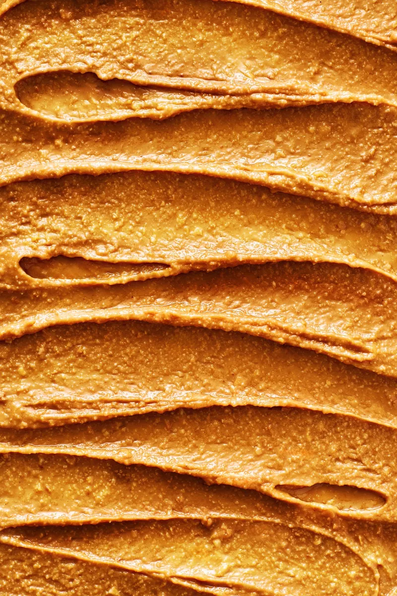 Peanut butter texture in waves, close-up